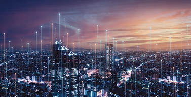 Telecommunication connections above smart city. Futuristic cityscape concept for internet of things (IoT), fintech, blockchain, 5G LTE network, wifi hotspot access, cyber security, digital technology